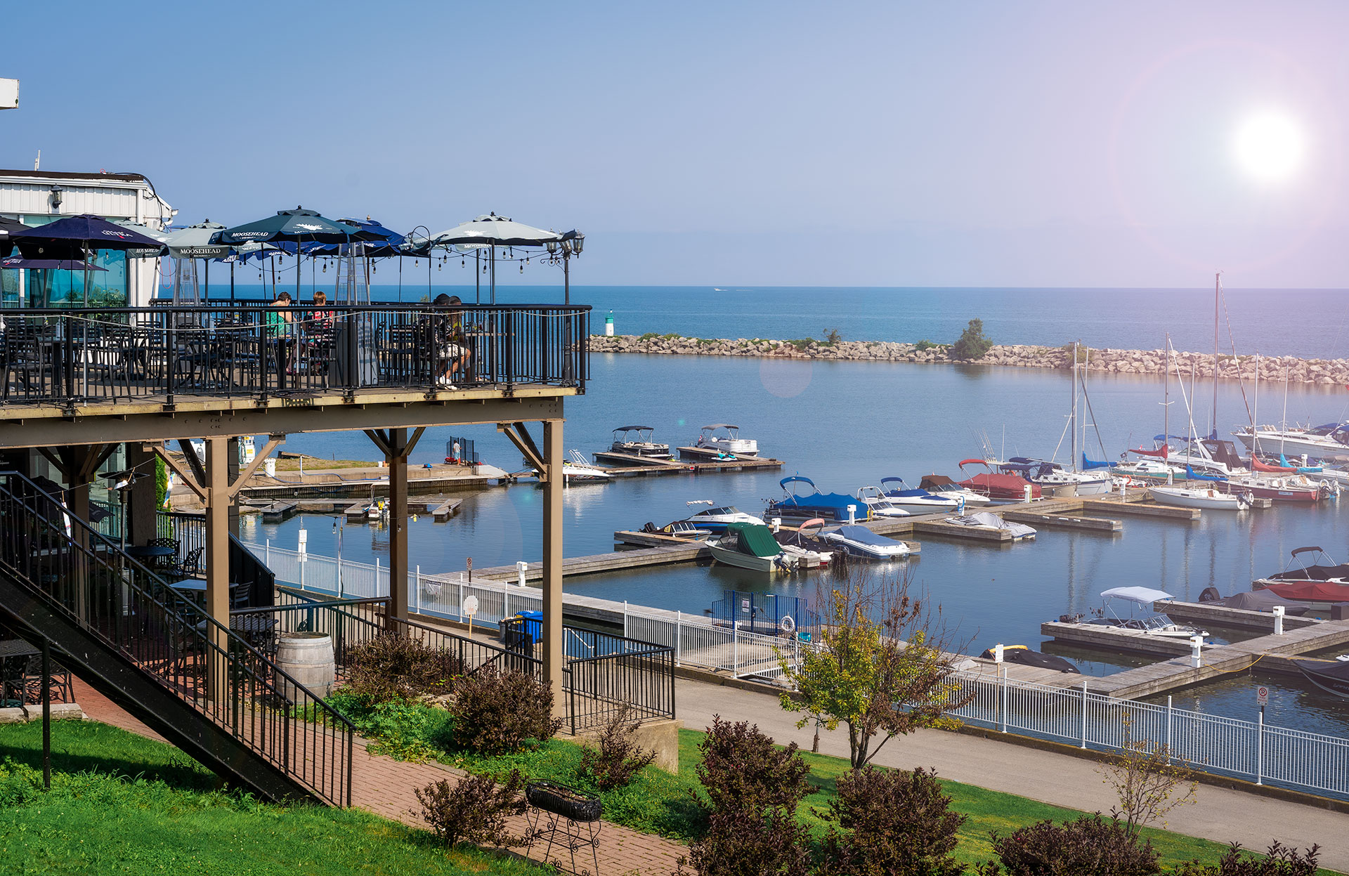 A marina filled with lots of boats on a sunny day